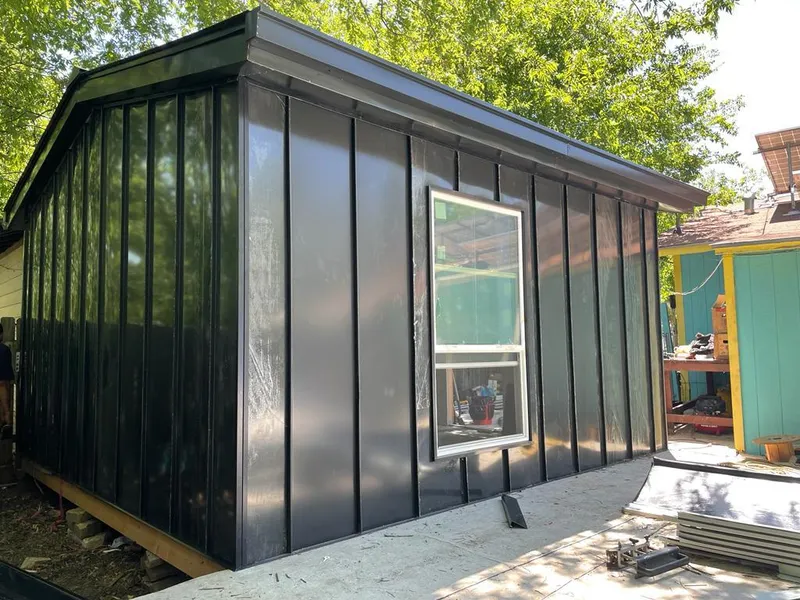 Black standing seam metal wall panels for Roof Inspection in Coalinga