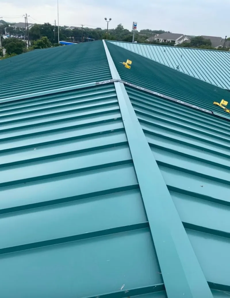 Green commercial metal roof ridge and valley for Metal Roof Repair in Coalinga
